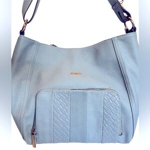 SkyBlue Shoulder Bag with Gold Finish & Decorative Front Pocket by Rossetti.